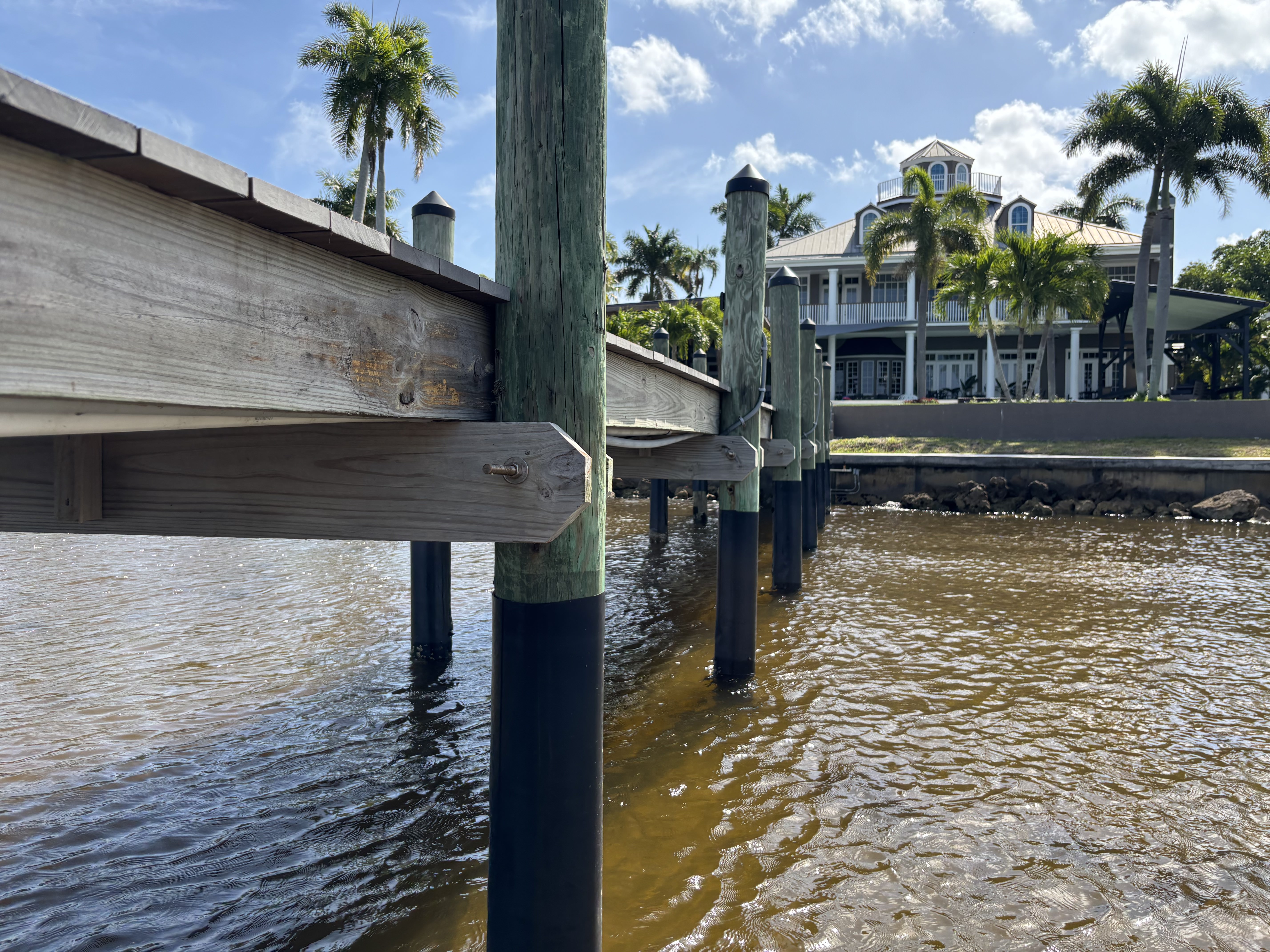 Civil site permitting project — dock piling construction adjacent to a waterfront residence